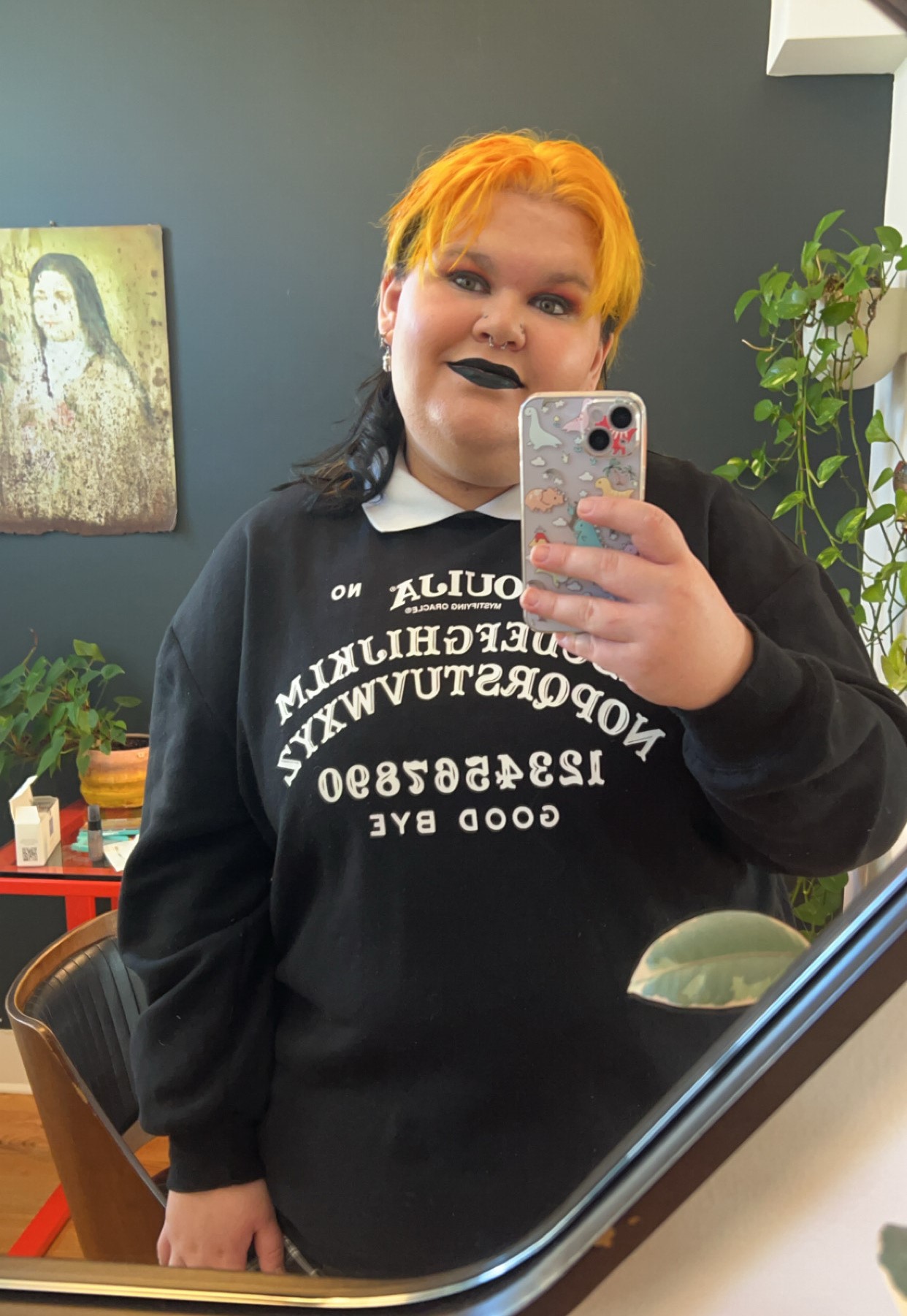 Employee KaiDean posing in mirror