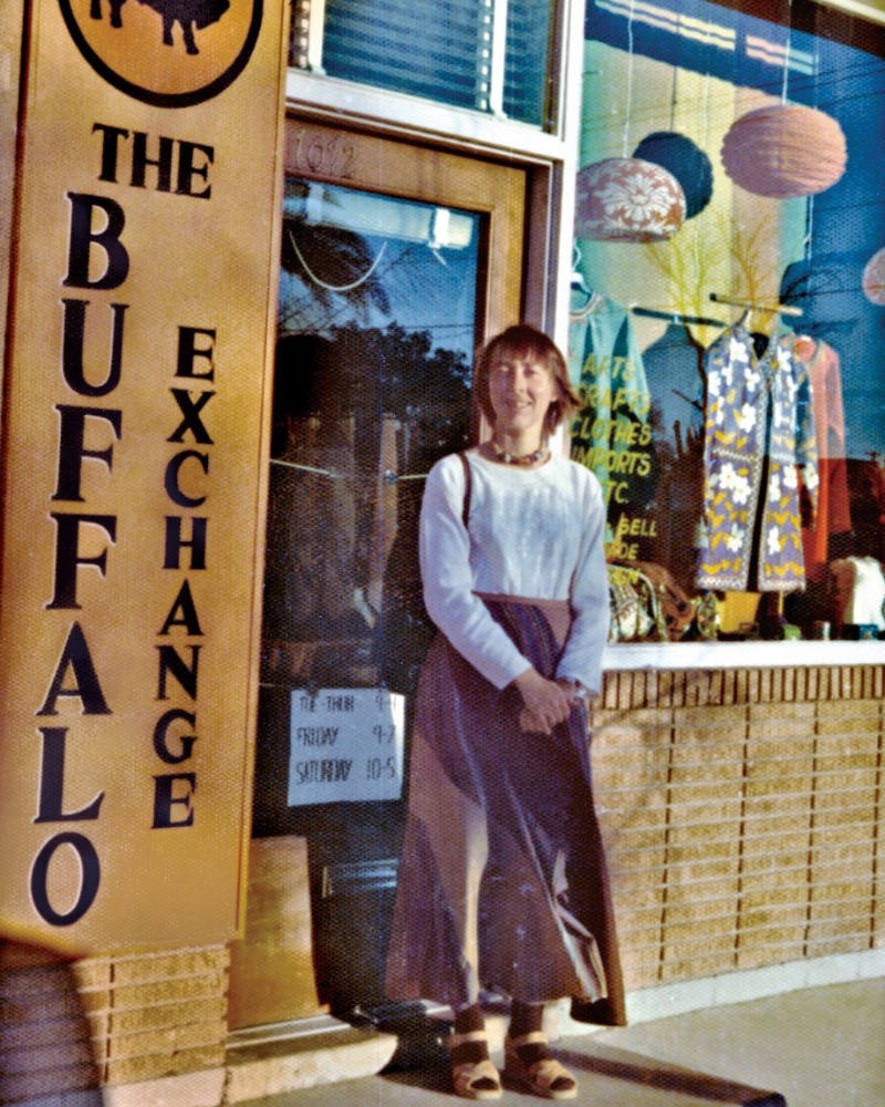 Vintage photo of Kerstin Block standing out front of the original Buffalo Exchange store